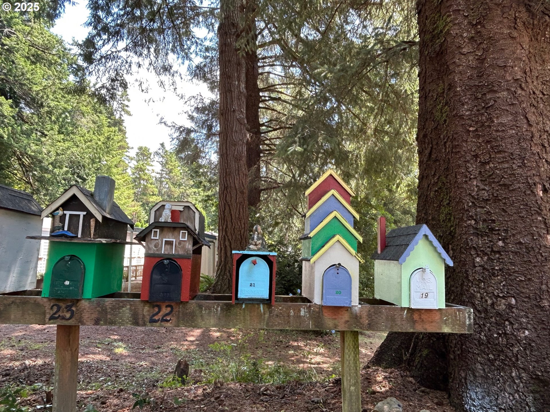 89510 Highway 101, Unit 23 Florence, OR 97439 - Photo 25 of 28 a house view with a outdoor space