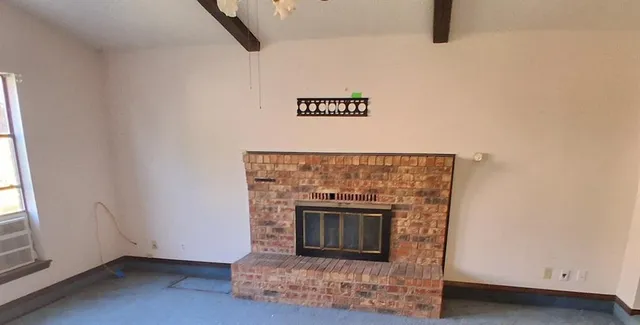 a room with a fireplace
