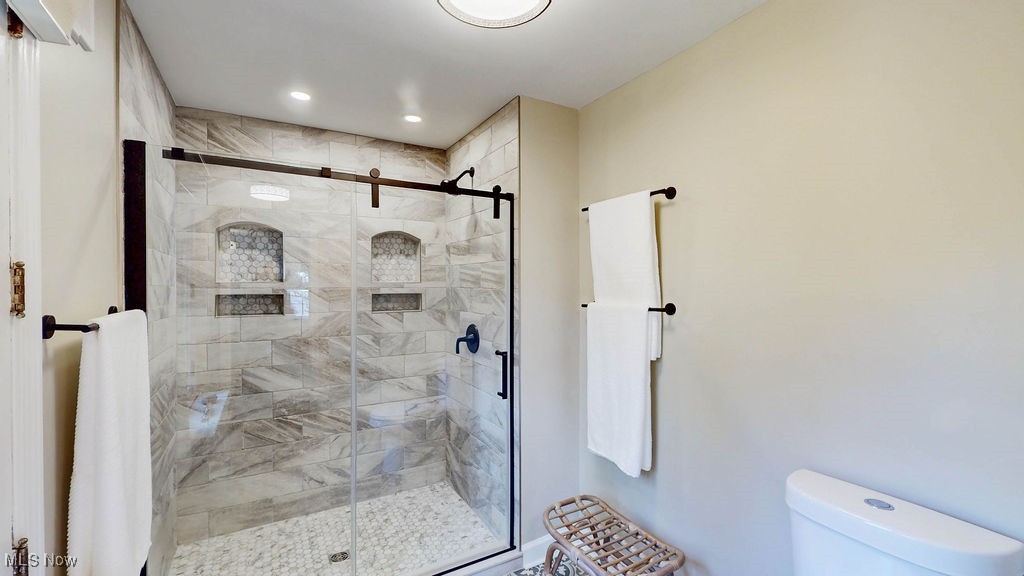 3077 Huntington Road Cleveland, OH 44120 - Photo 19 of 37 Bathroom with a shower stall and recessed lighting