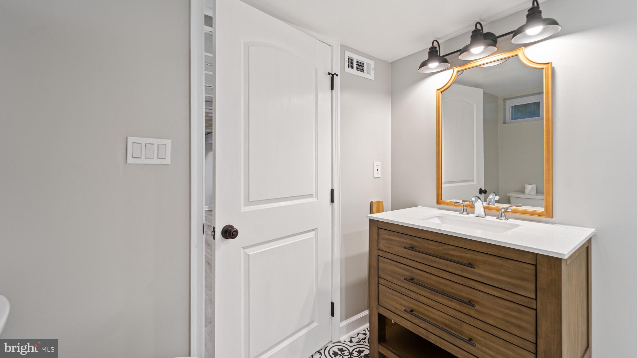 5713 Moore Street Brooklyn, MD 21225 - Photo 14 of 31 Completely Updated Bathroom