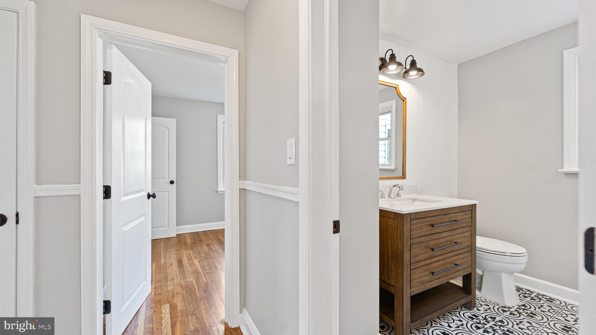 5713 Moore Street Brooklyn, MD 21225 - Photo 27 of 31 Hall/Completely Updated Bathroom