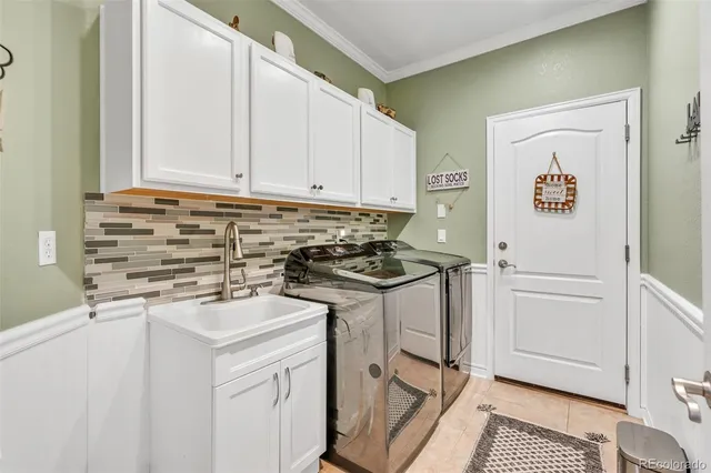 a kitchen with a stove a sink and a refrigerator