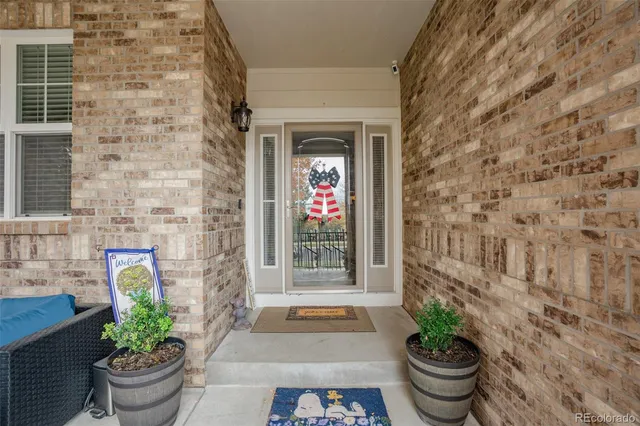 a front view of a house with outdoor space
