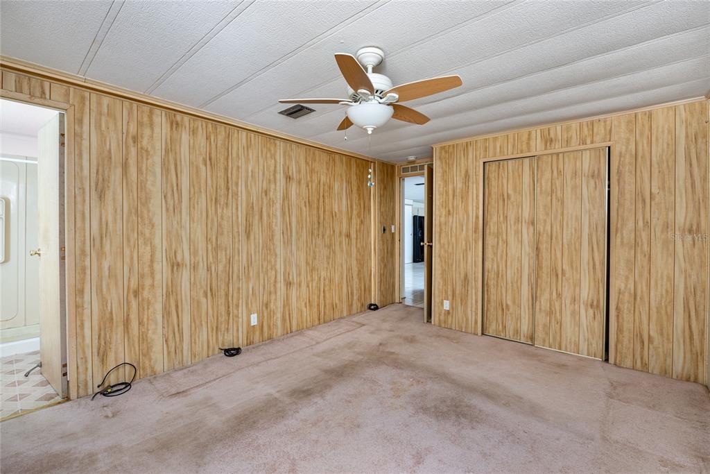 2542 Longpine Lane St. Cloud, FL 34772 - Photo 19 of 35 a view of a livingroom with a ceiling fan and window