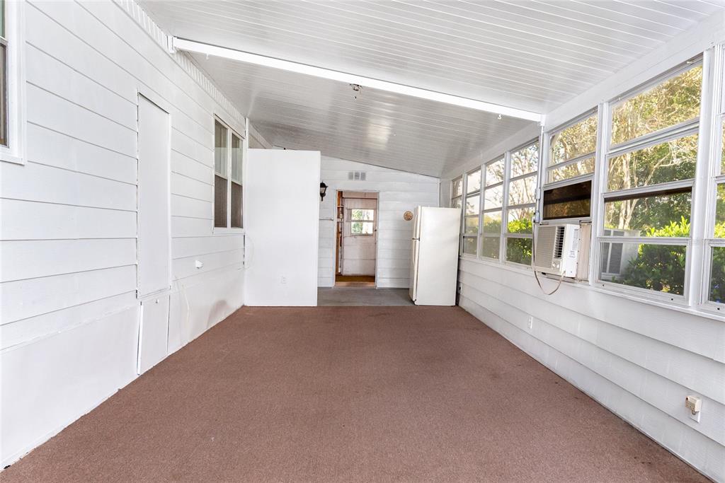 2542 Longpine Lane St. Cloud, FL 34772 - Photo 22 of 35 a view of a big room with windows and entryway