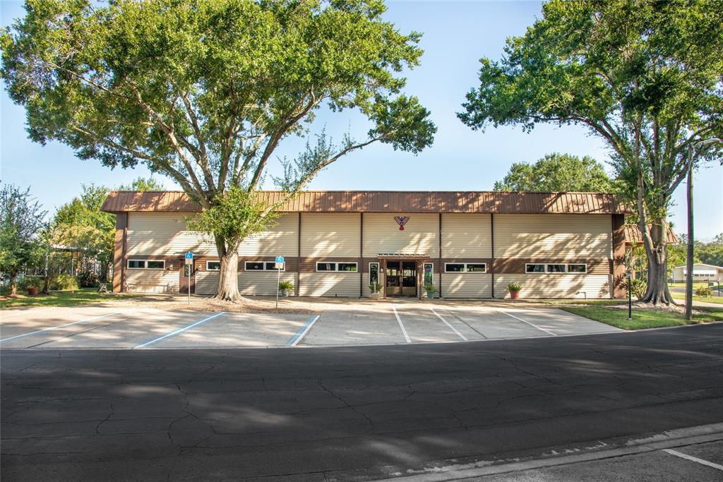 2542 Longpine Lane St. Cloud, FL 34772 - Photo 28 of 35 front view of a building with a street