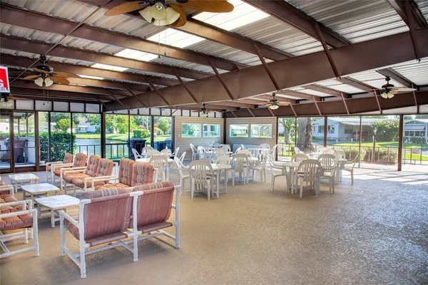 a outdoor space with lots of tables and chairs