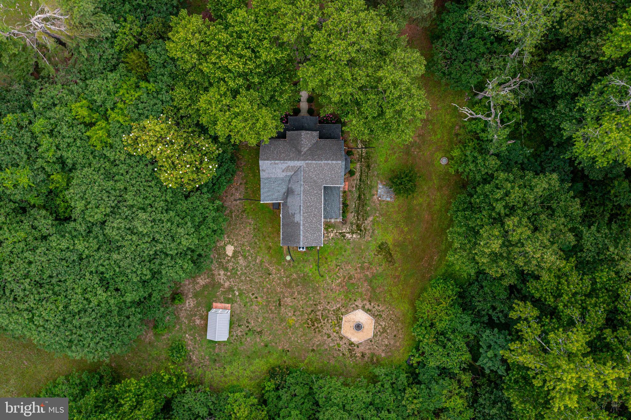 3952 Irvington Road Irvington, VA 22480 - Photo 57 of 77 an aerial view of a house with a yard