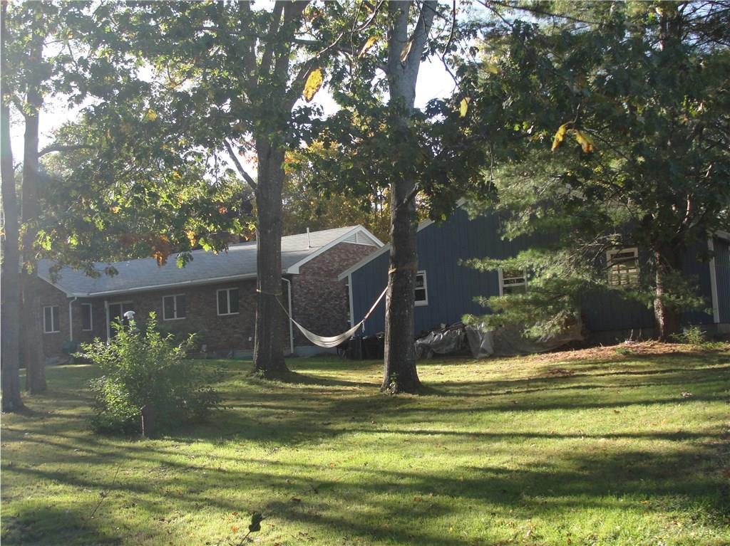 Rear yard behind garage, a great...