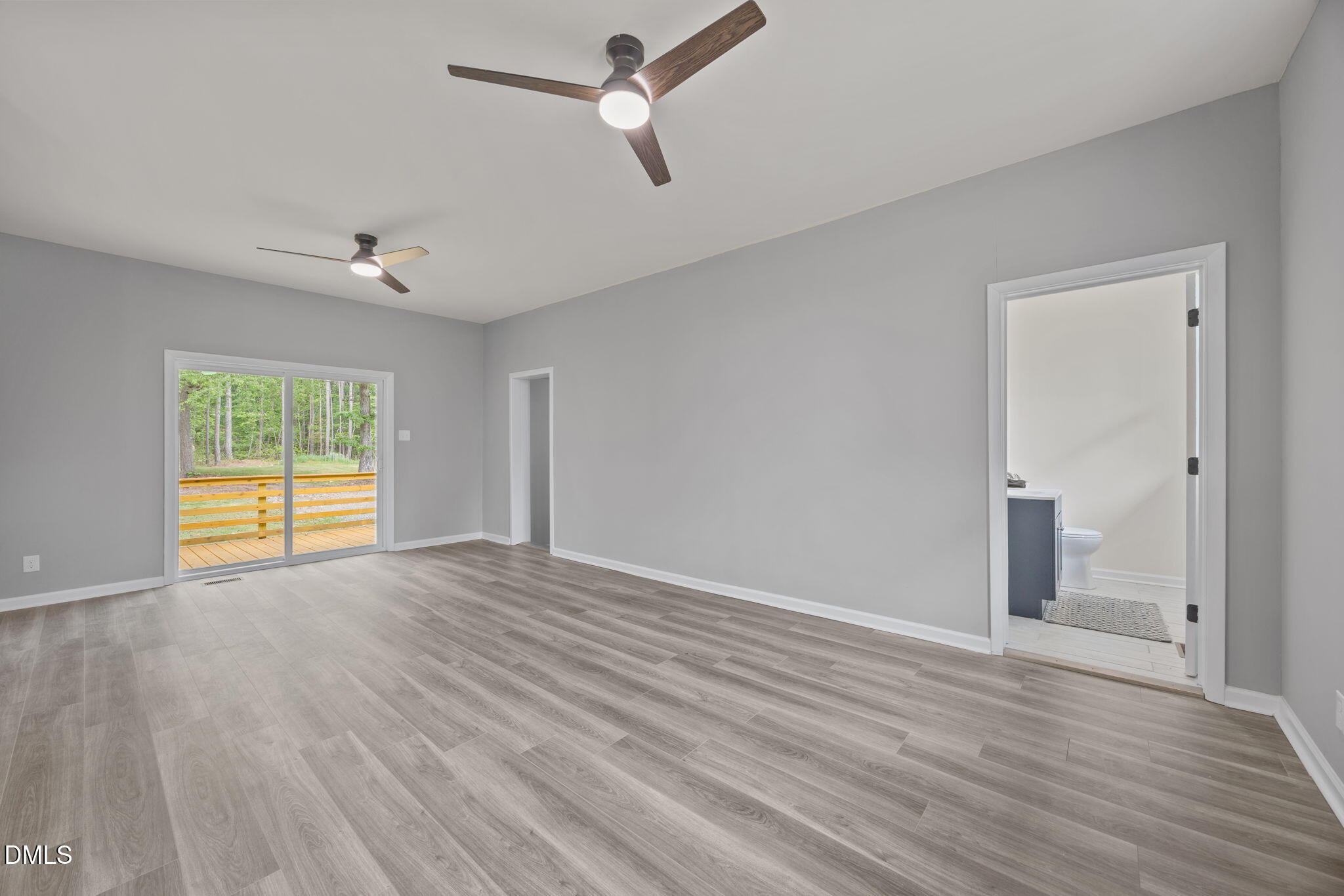 6561 Huntsboro Road Oxford, NC 27565 - Photo 17 of 41 wooden floor in an empty room with a window