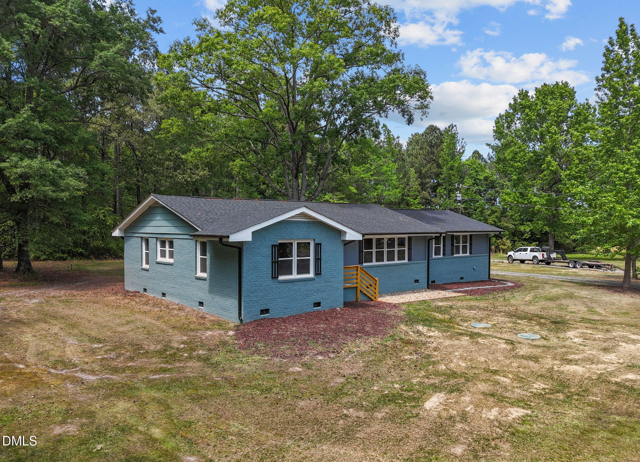 6561 Huntsboro Road Oxford, NC 27565 - Photo 2 of 41 front view of a house with a yard