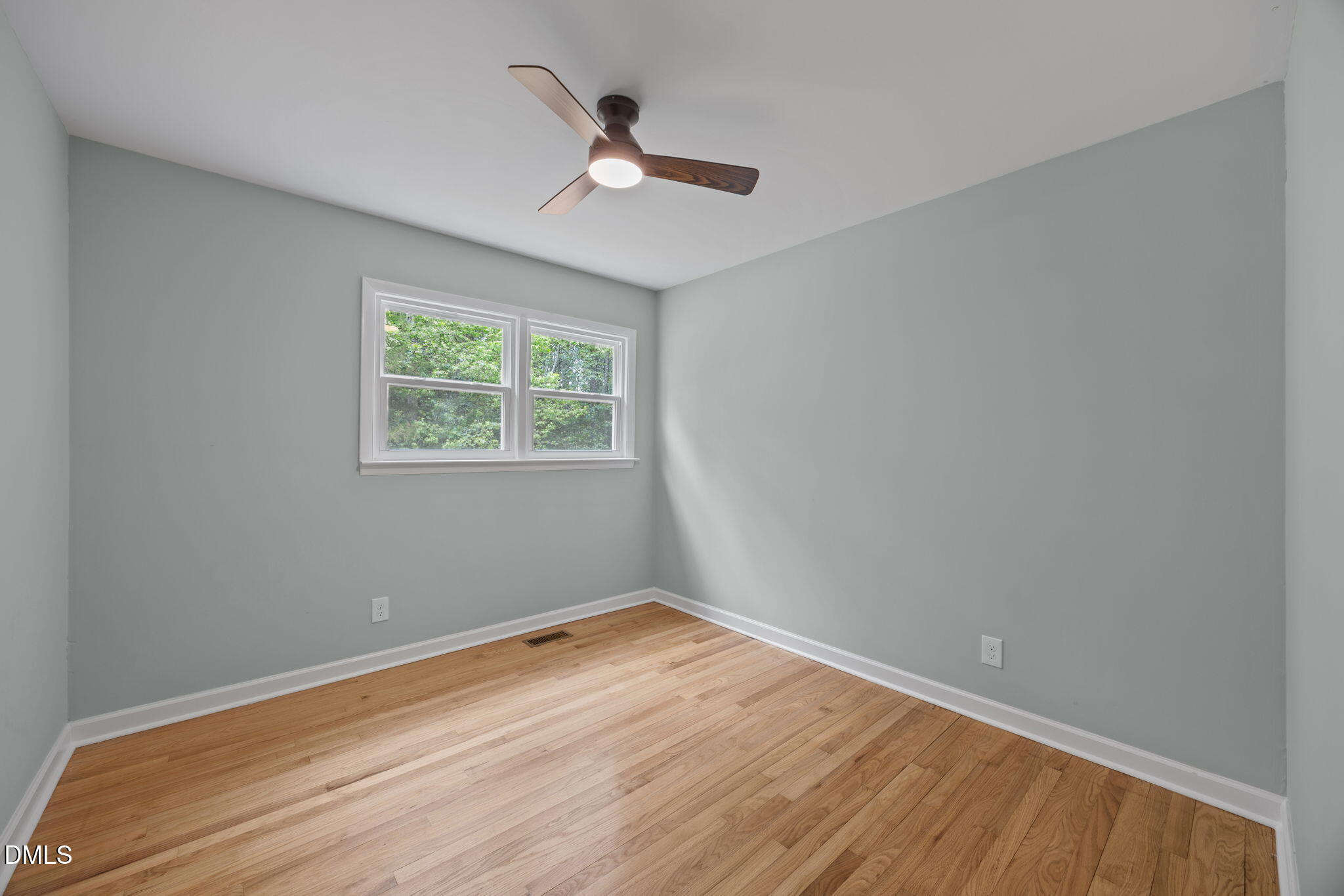 6561 Huntsboro Road Oxford, NC 27565 - Photo 27 of 41 wooden floor in an empty room with a window
