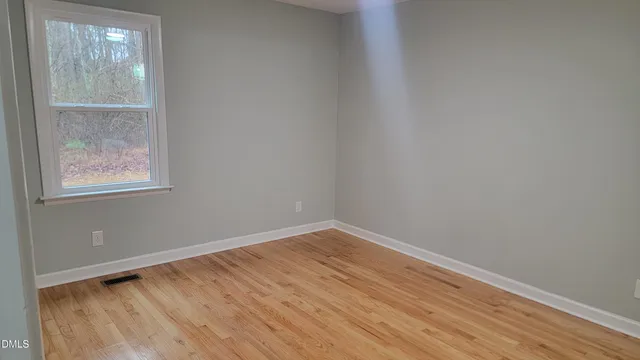 an empty room with a window