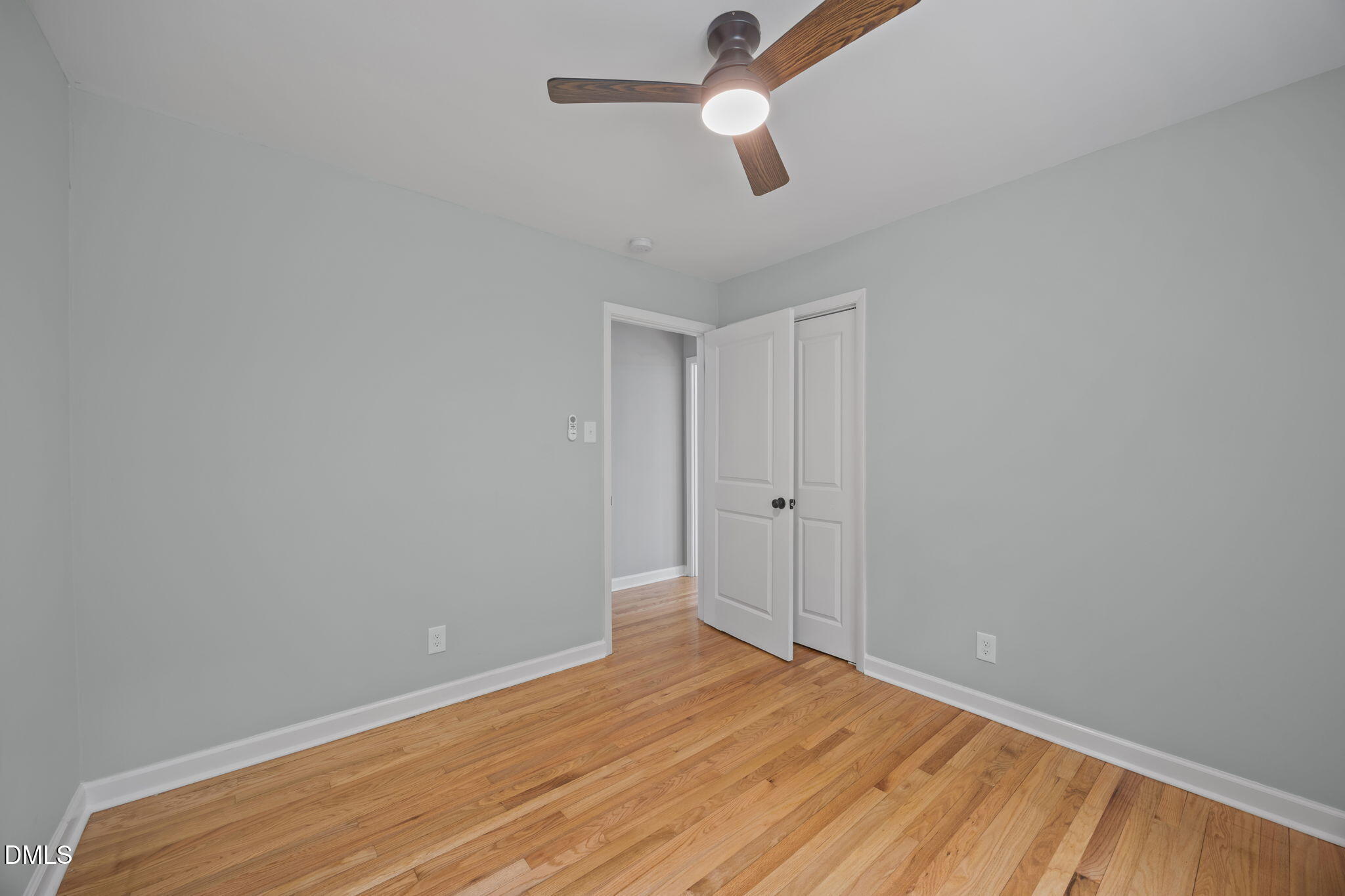 6561 Huntsboro Road Oxford, NC 27565 - Photo 32 of 41 a view of room with wooden floor and ceiling fan