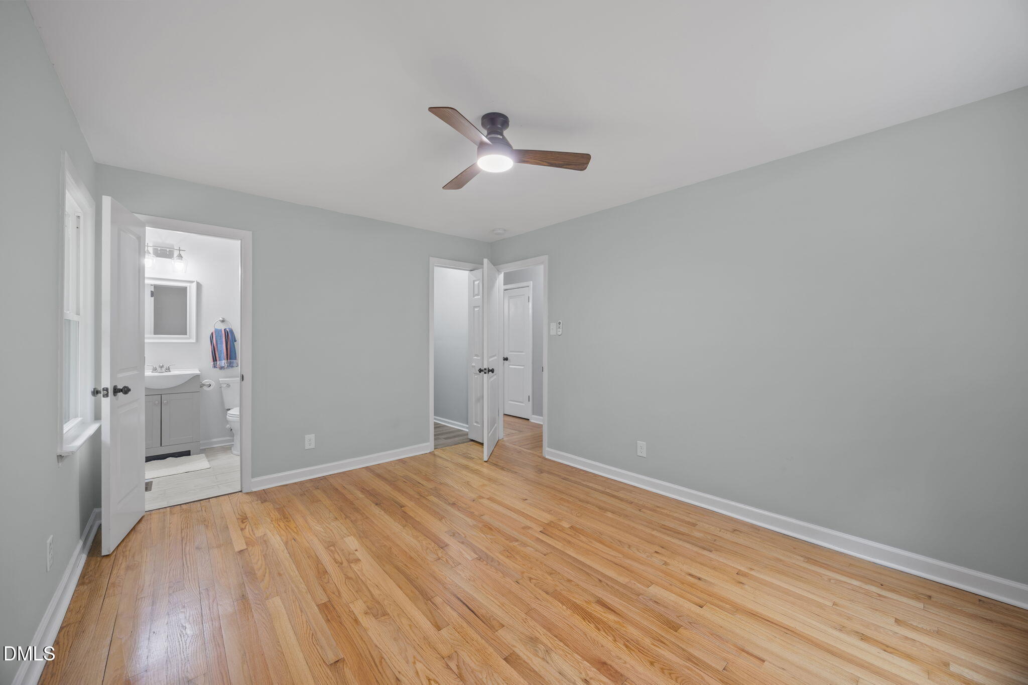 6561 Huntsboro Road Oxford, NC 27565 - Photo 34 of 41 a view of room with wooden floor and ceiling fan