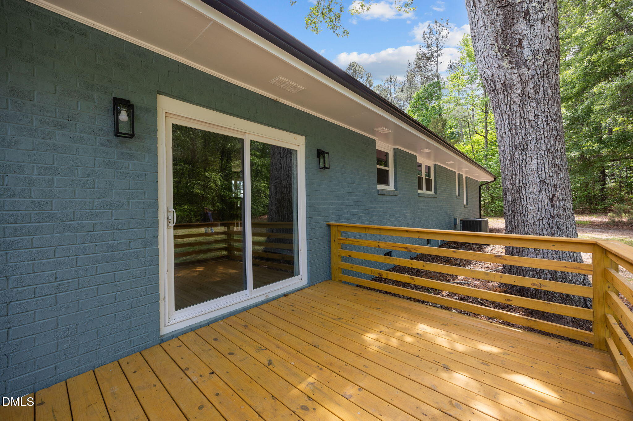 6561 Huntsboro Road Oxford, NC 27565 - Photo 38 of 41 a backyard of a house with wooden floor and fence