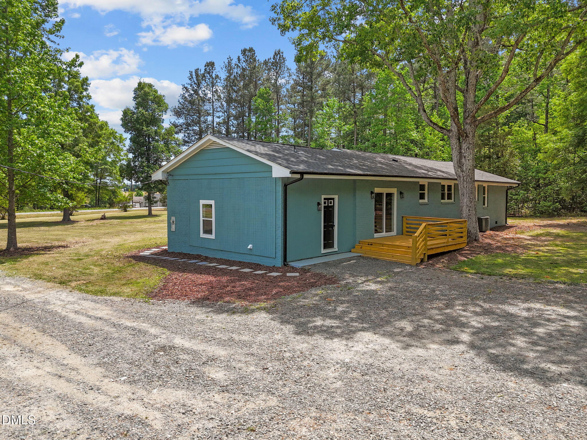 6561 Huntsboro Road Oxford, NC 27565 - Photo 5 of 41 a view of a house with backyard