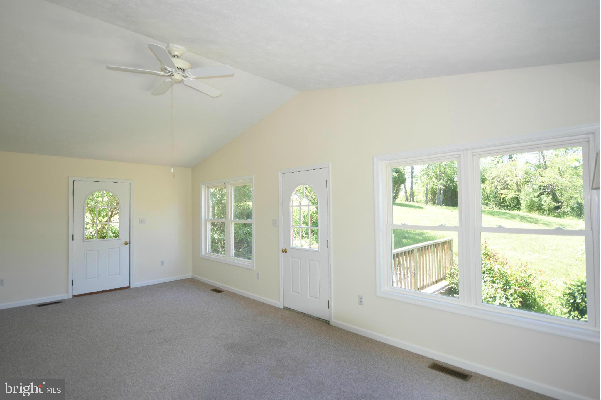 279 Ridgeview Lane Washington, VA 22747 - Photo 6 of 11 an empty room with windows and closet