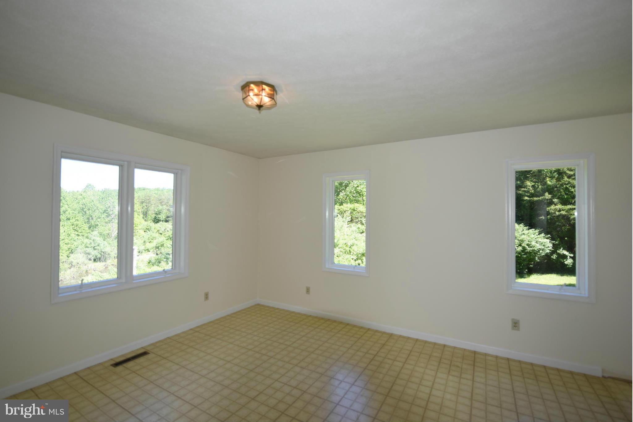 279 Ridgeview Lane Washington, VA 22747 - Photo 7 of 11 a view of an empty room with a window