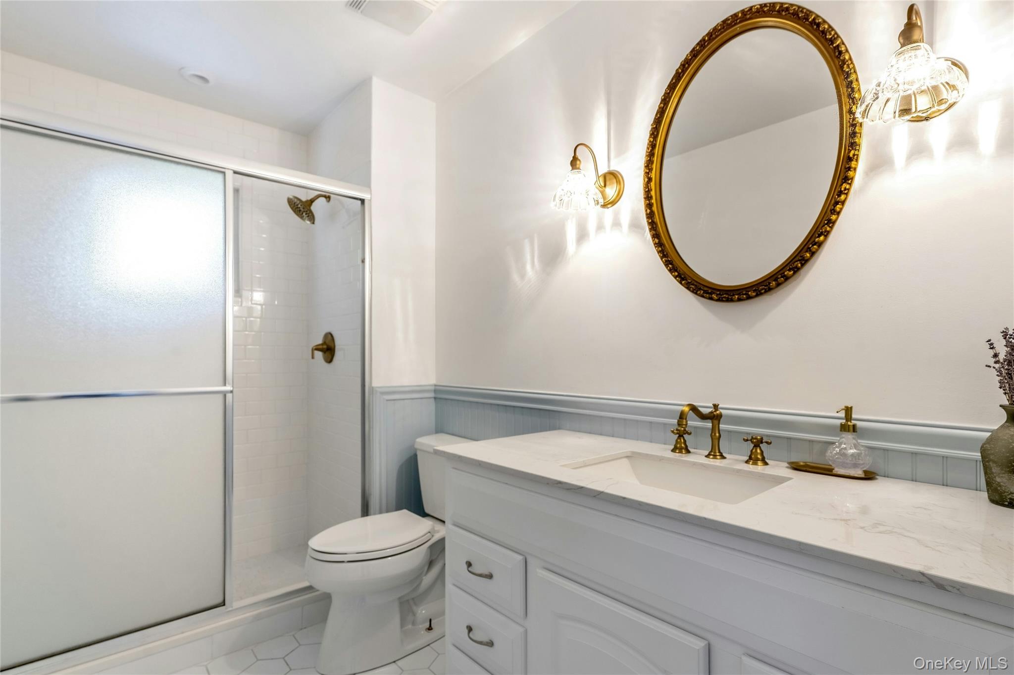 121 Grove Road Kings Park, NY 11754 - Photo 14 of 24 a bathroom with a sink and a mirror