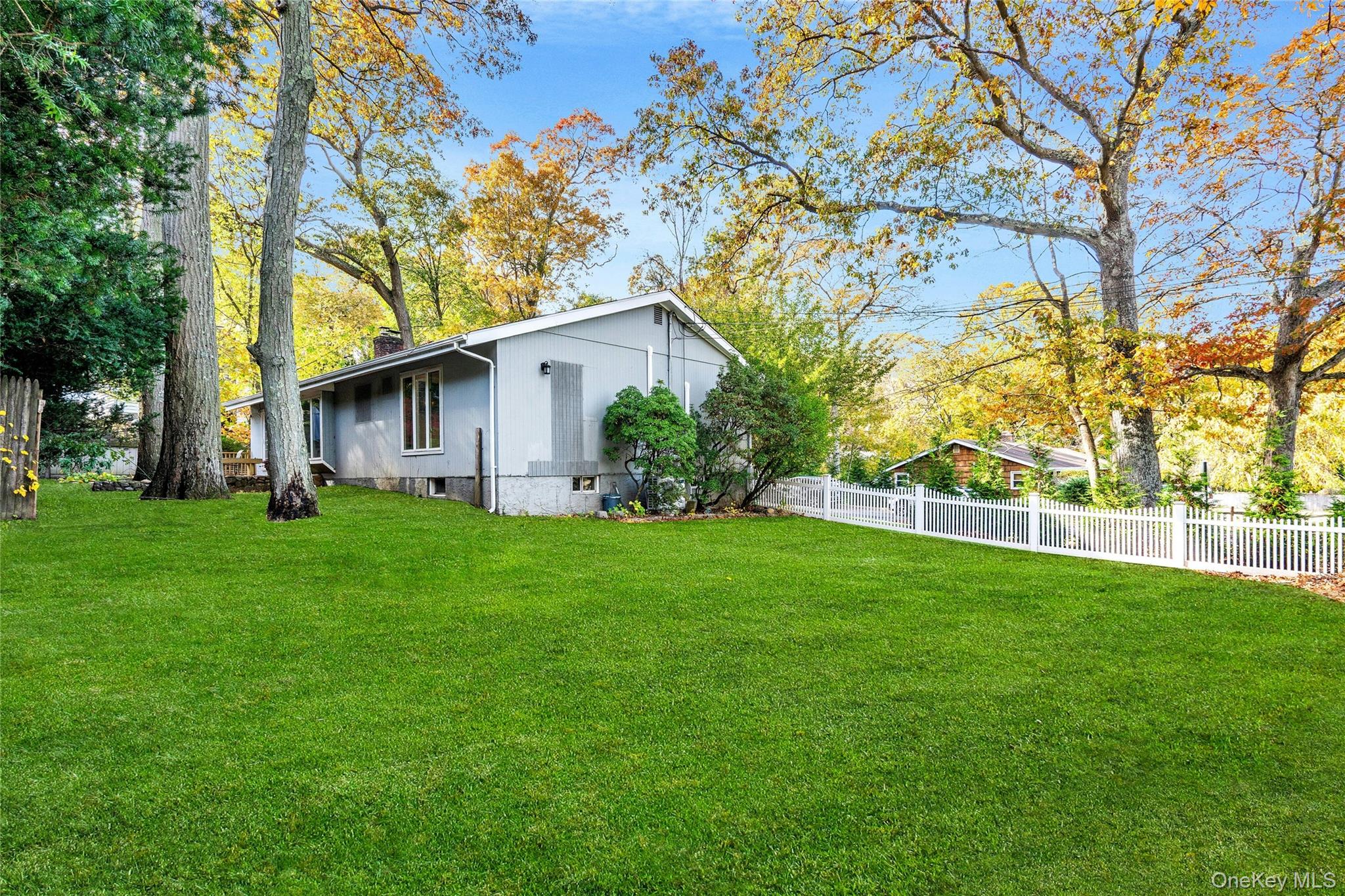 121 Grove Road Kings Park, NY 11754 - Photo 21 of 24 a view of a yard with a house and garden