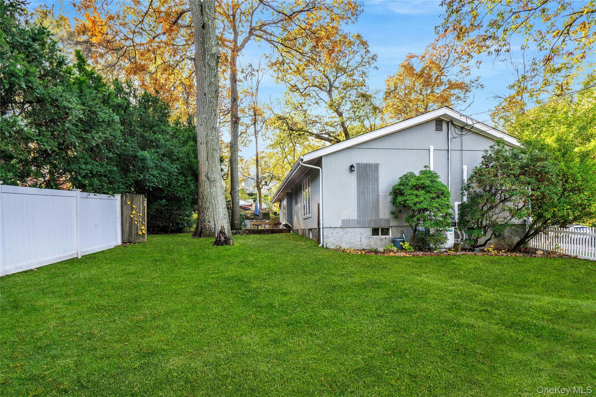 121 Grove Road Kings Park, NY 11754 - Photo 22 of 24 a view of a house with backyard and garden