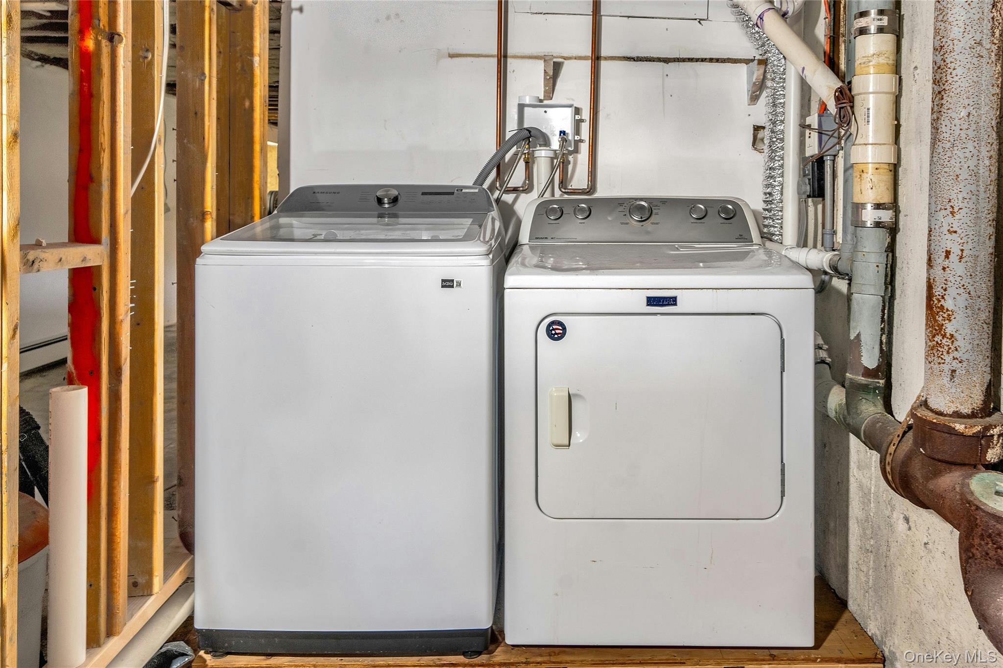 121 Grove Road Kings Park, NY 11754 - Photo 24 of 24 a utility room with dryer and washer
