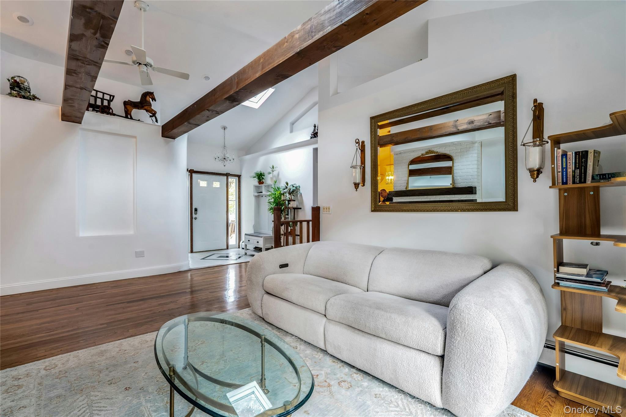 121 Grove Road Kings Park, NY 11754 - Photo 5 of 24 a living room with furniture and a flat screen tv