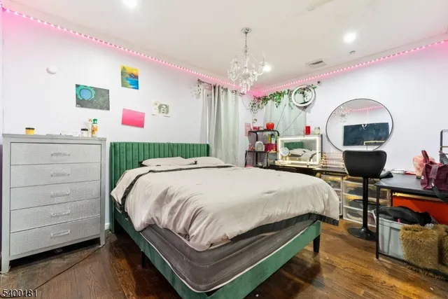 a bed room with a bed and a fish tank