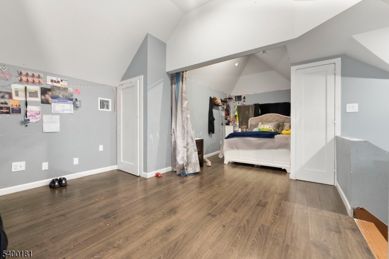 263 Stiles Street Elizabeth, NJ 07208 - Photo 24 of 30 a living room with furniture and a wooden floor