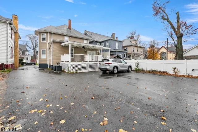 a car parked in front of a house