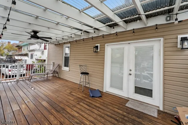 a view of a porch with wooden floor