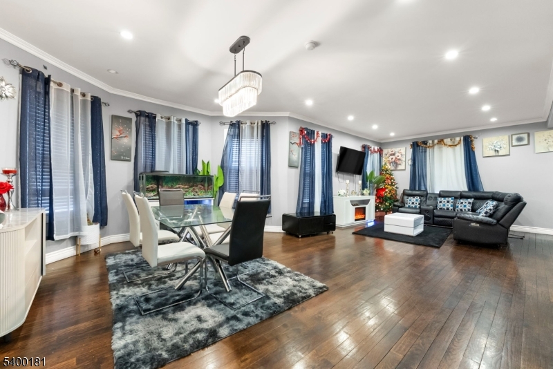 263 Stiles Street Elizabeth, NJ 07208 - Photo 9 of 30 a view of a livingroom with furniture and a rug