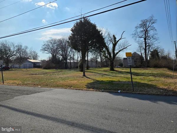 a view of a house with a big yard