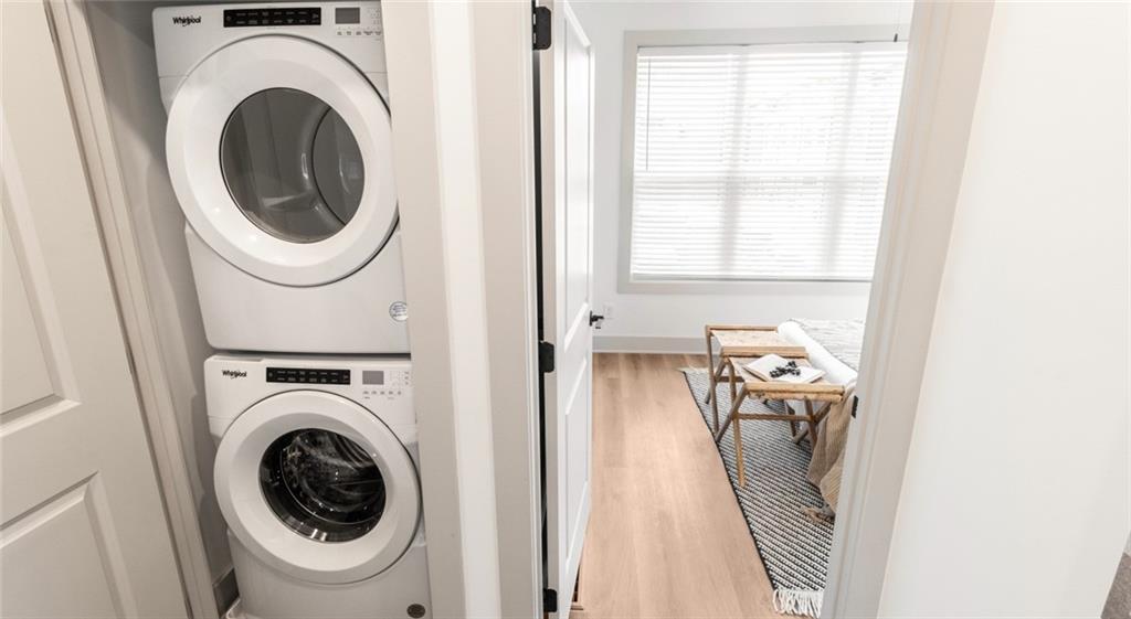 277 Clifton Street Southeast, Unit A1 Atlanta, GA 30317 - Photo 21 of 30 a utility room with dryer and washer
