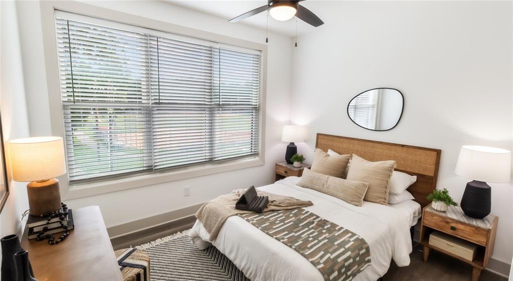 277 Clifton Street Southeast, Unit A1 Atlanta, GA 30317 - Photo 26 of 30 a bedroom with a bed and a window