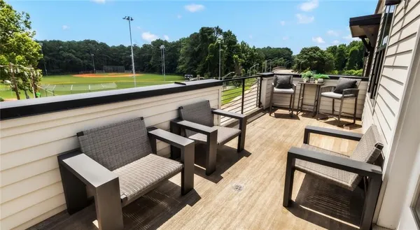 a view of a terrace with chairs