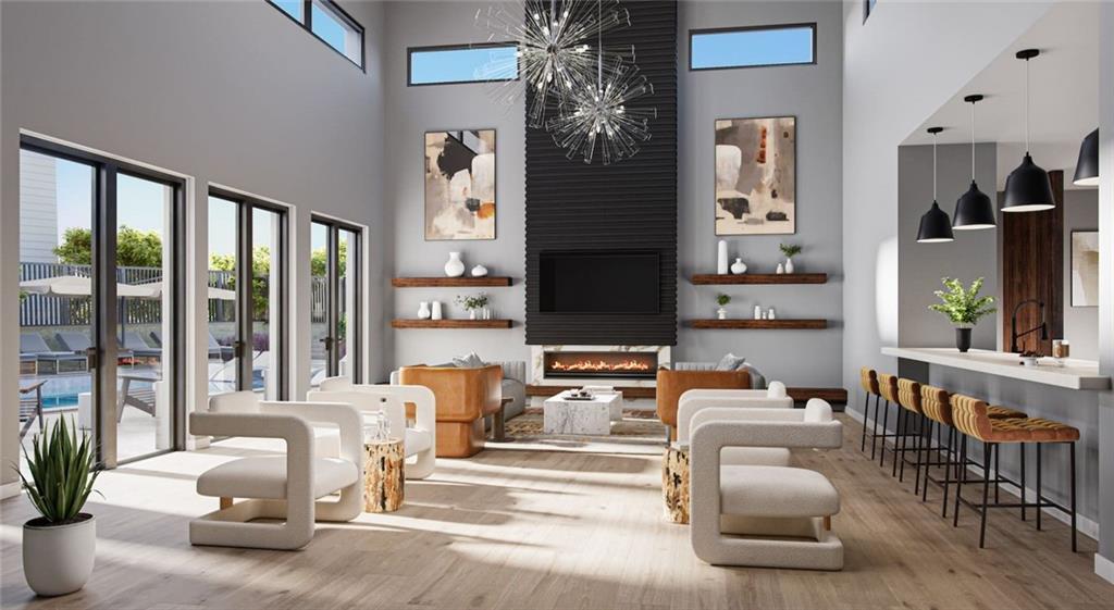 277 Clifton Street Southeast, Unit A1 Atlanta, GA 30317 - Photo 3 of 30 a living room with furniture and a large window