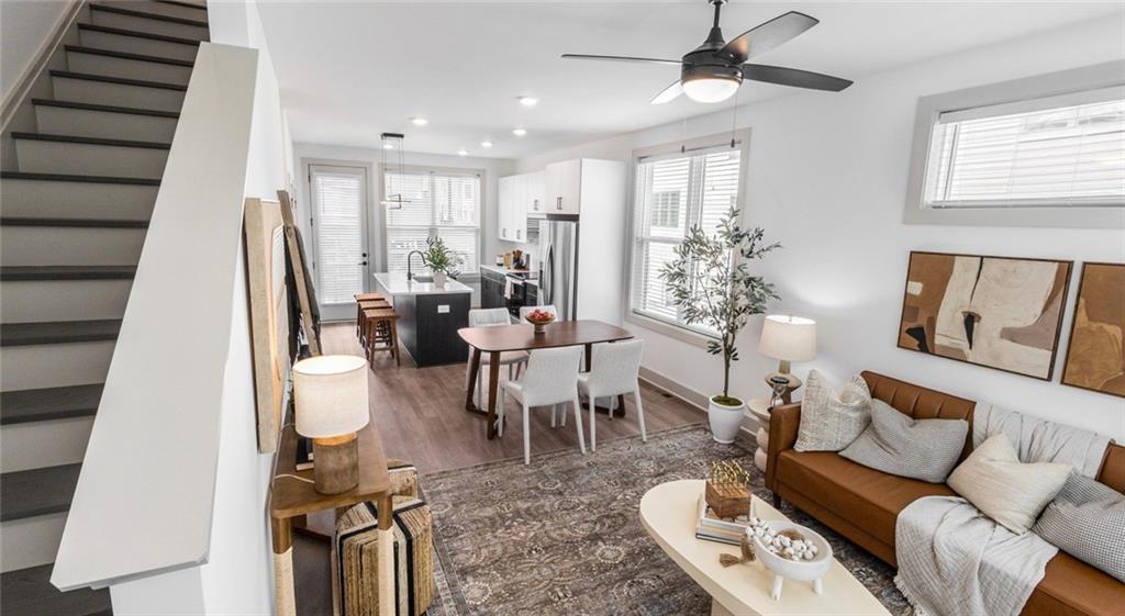 277 Clifton Street Southeast, Unit A1 Atlanta, GA 30317 - Photo 6 of 30 a living room with furniture and a large window