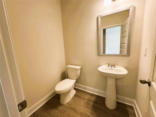 a bathroom with a sink and a toilet