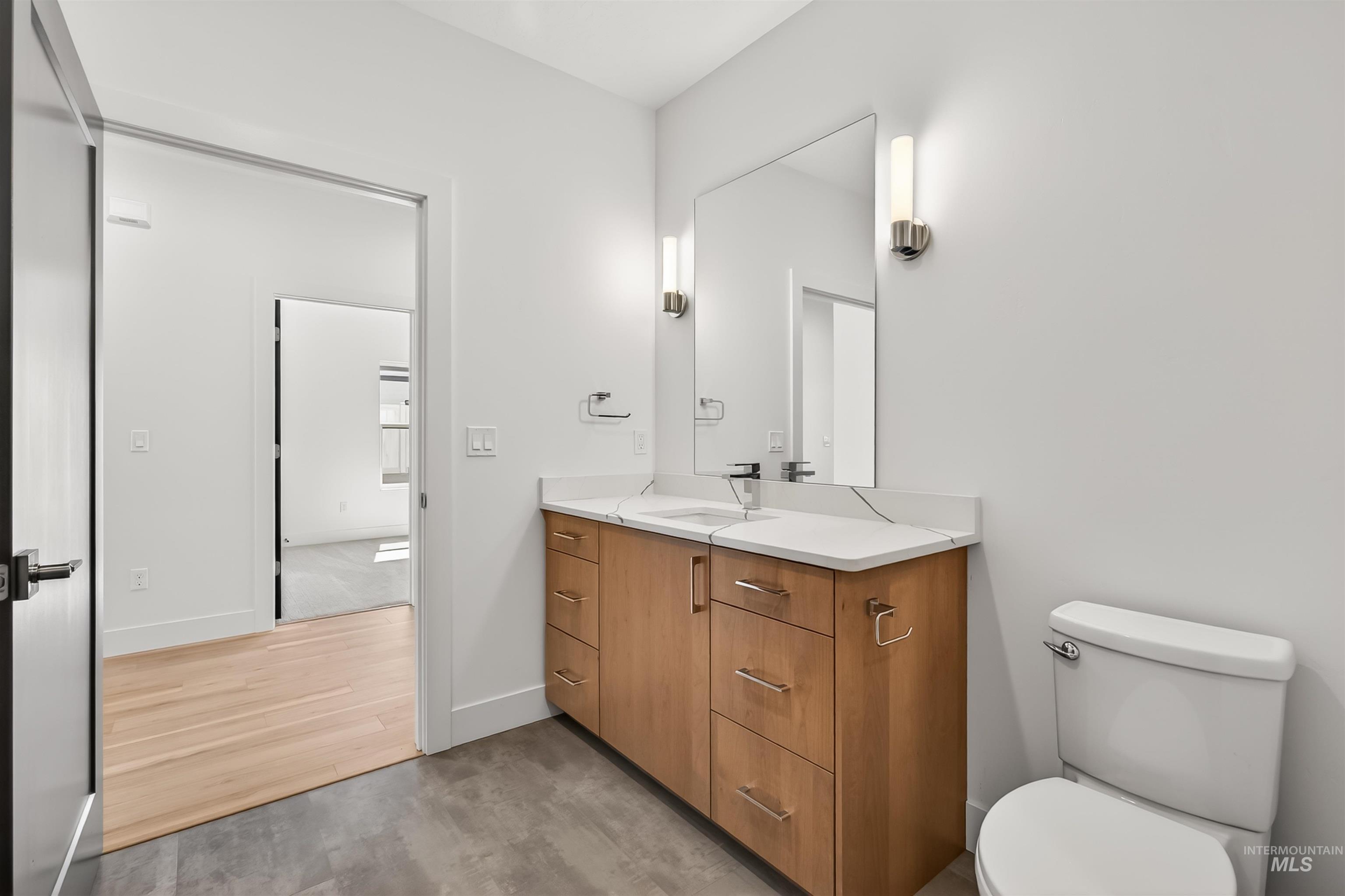 3710 22nd Street Lewiston, ID 83501 - Photo 14 of 36 Bathroom featuring vanity and light wood finished floors