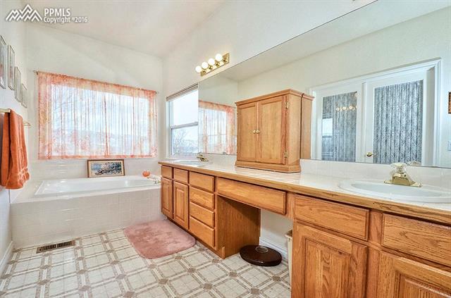 12208 Stanley Canyon Road Colorado Springs, CO 80921 - Photo 13 of 27 5-piece master bathroom.