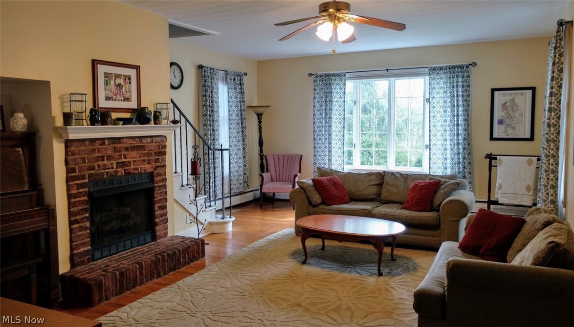 208 Prospect Road Berea, OH 44017 - Photo 6 of 20 The living room is spacious (there's lots of room behind that couch!). Check out the gas fireplace and piano nook! (The piano can stay if you wish!)