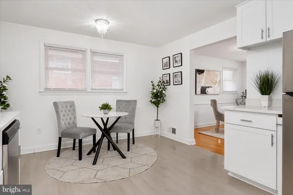 a view of a dining room with furniture