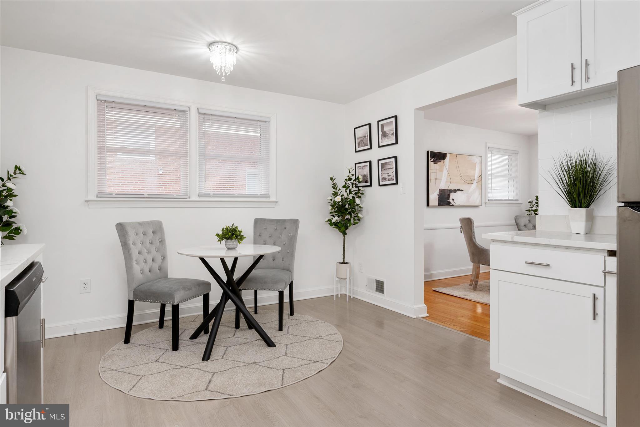 11006 Childs Street Silver Spring, MD 20901 - Photo 13 of 42 a view of a dining room with furniture