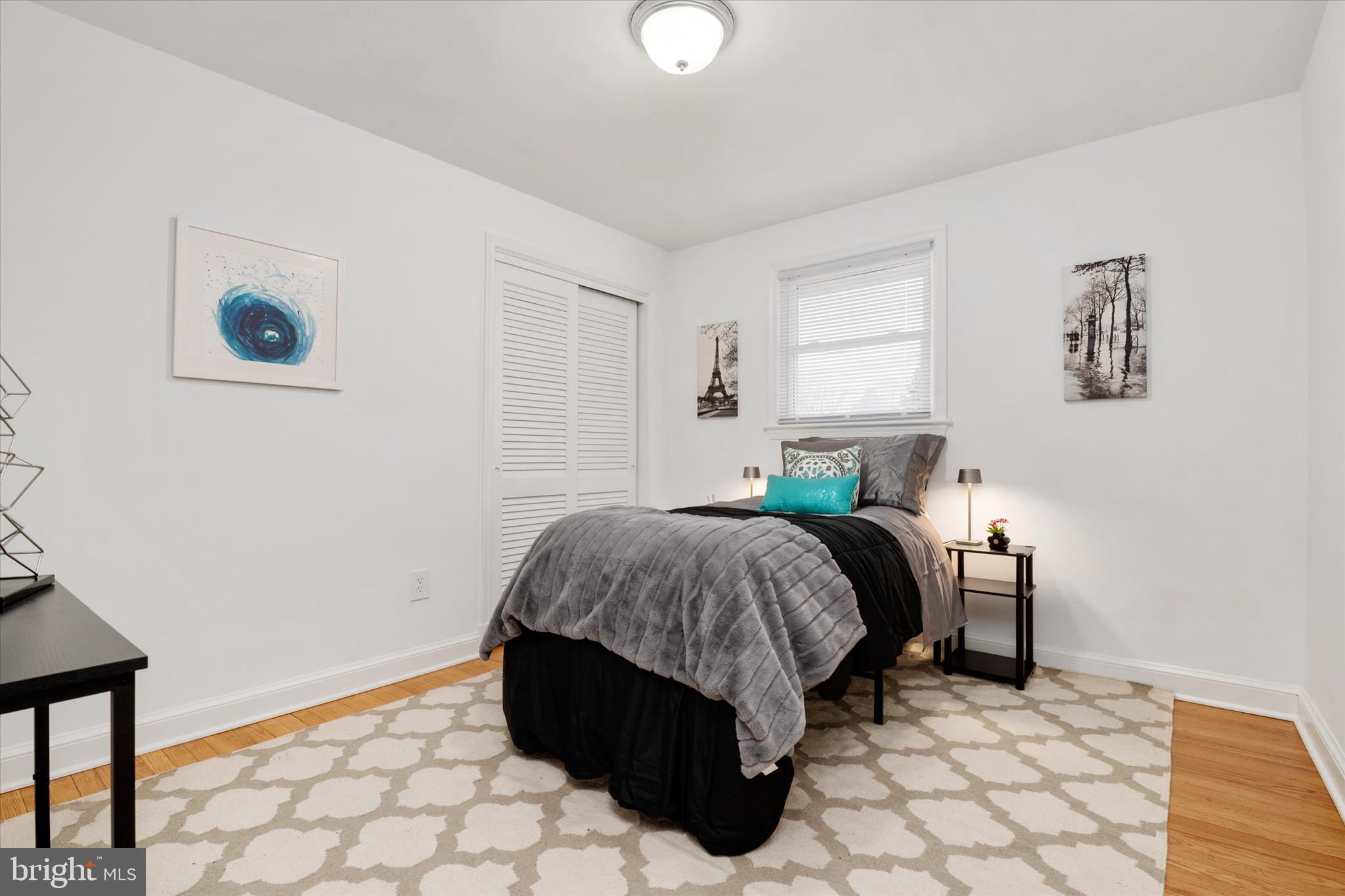 11006 Childs Street Silver Spring, MD 20901 - Photo 19 of 42 a bedroom with a bed and a window
