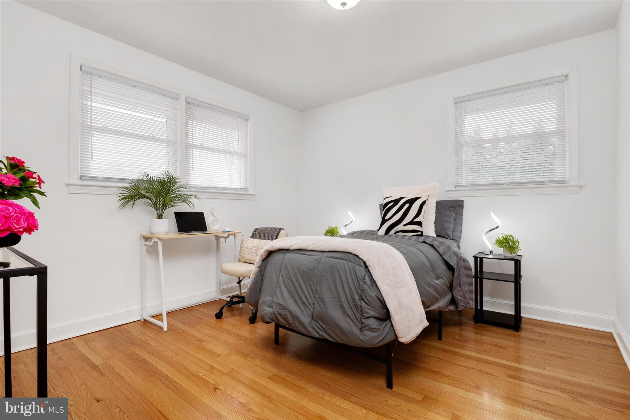 11006 Childs Street Silver Spring, MD 20901 - Photo 20 of 42 a bedroom with a bed and wooden floor