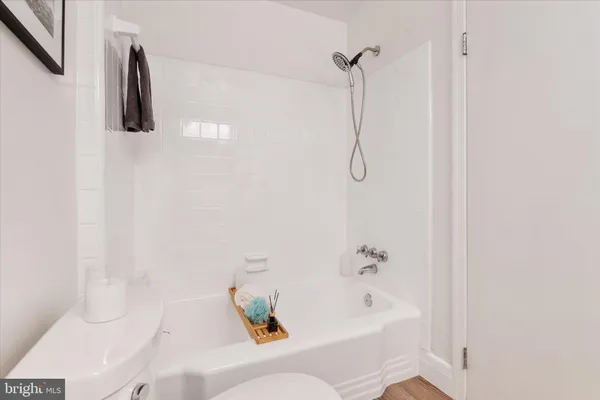 a bathroom with a bath tub