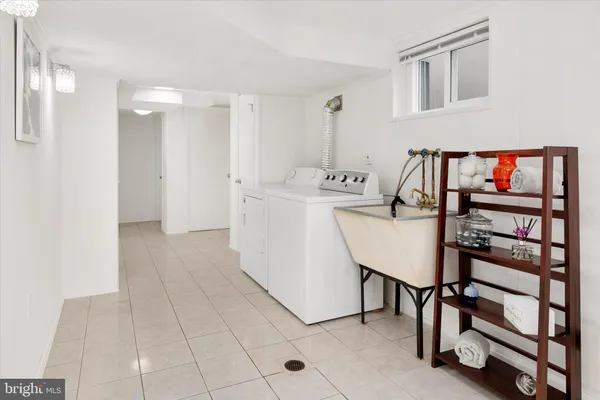 an aerial view of a house with swimming pool garden and patio