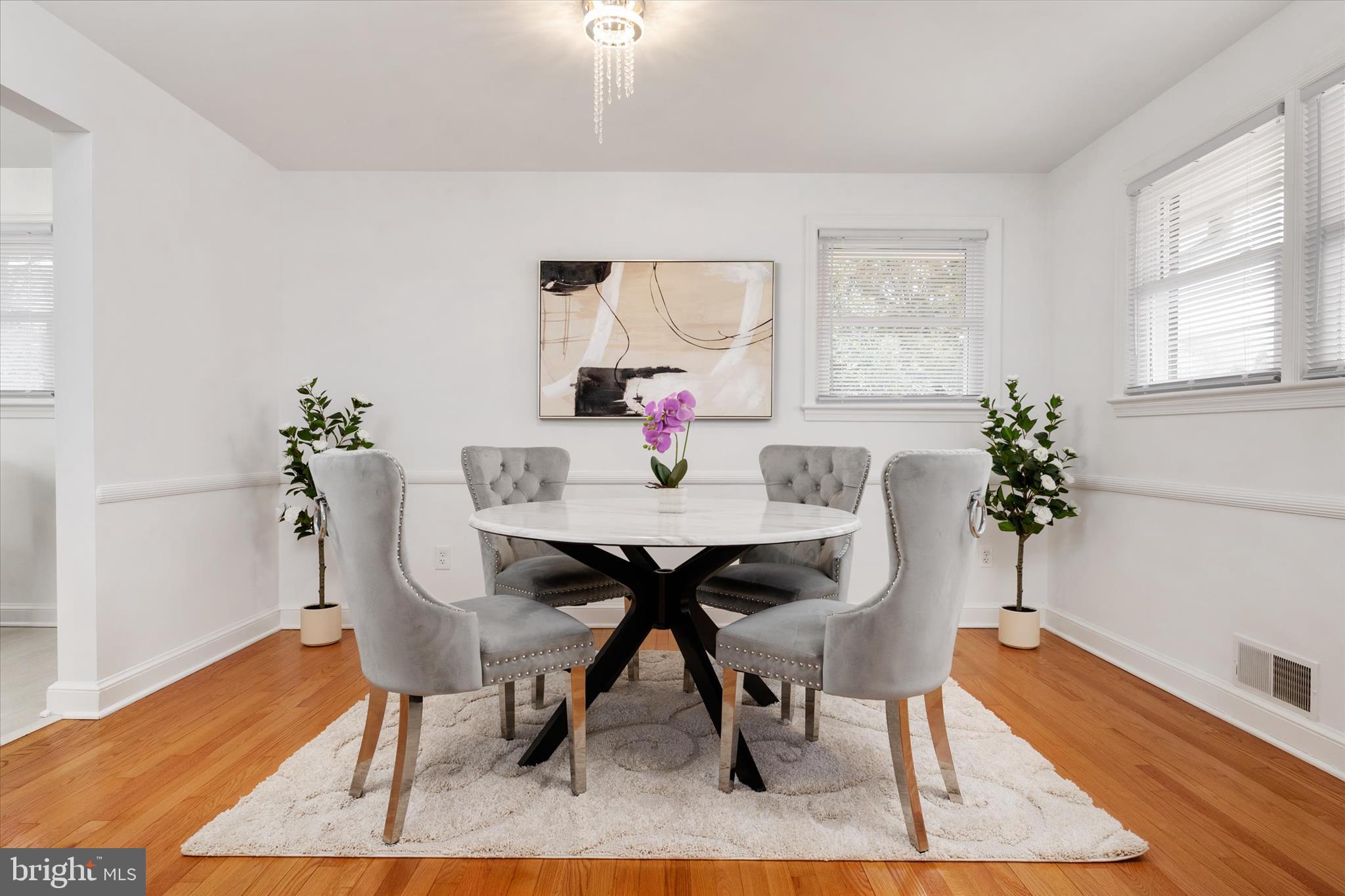 11006 Childs Street Silver Spring, MD 20901 - Photo 9 of 42 a view of a dining room with furniture and wooden floor